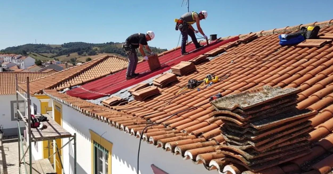 Atlantic Roof Care team installing tiles